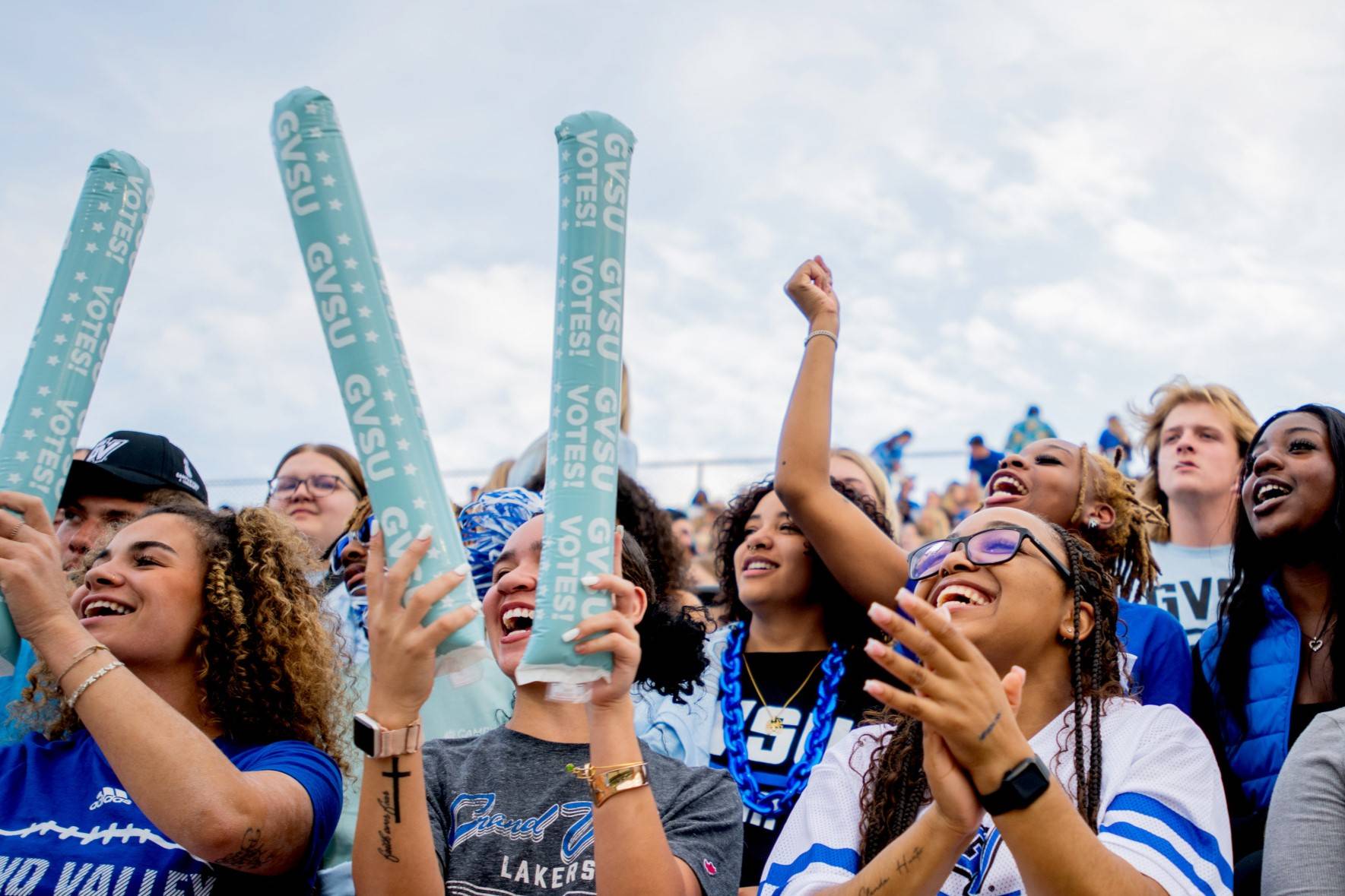 Fans cheer on the Lakers and anchor up during a football game